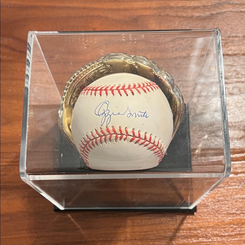 Ozzie Smith Autographed Baseball in Display Case in mint condition